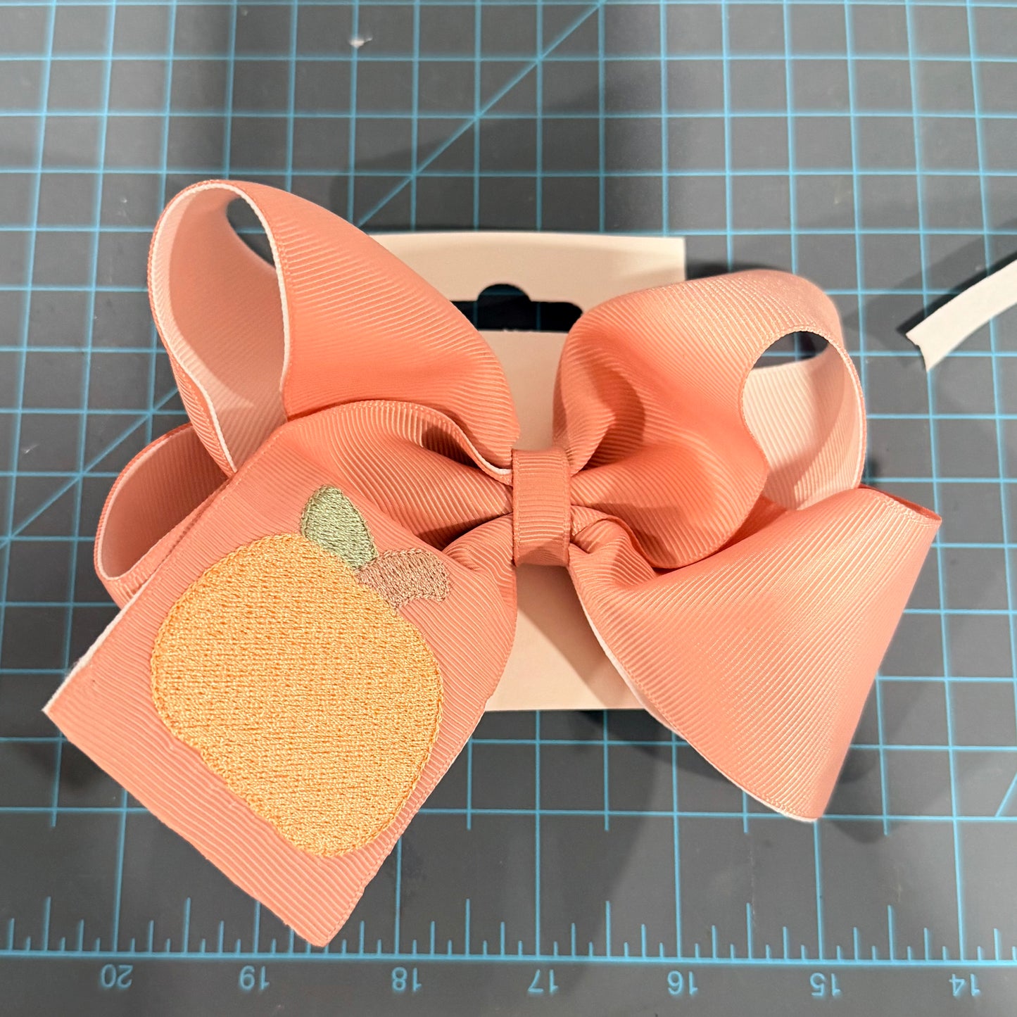 Embroidered pumpkin bow