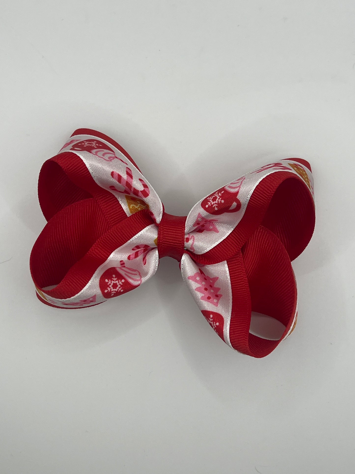 Red and pink Christmas treats bow