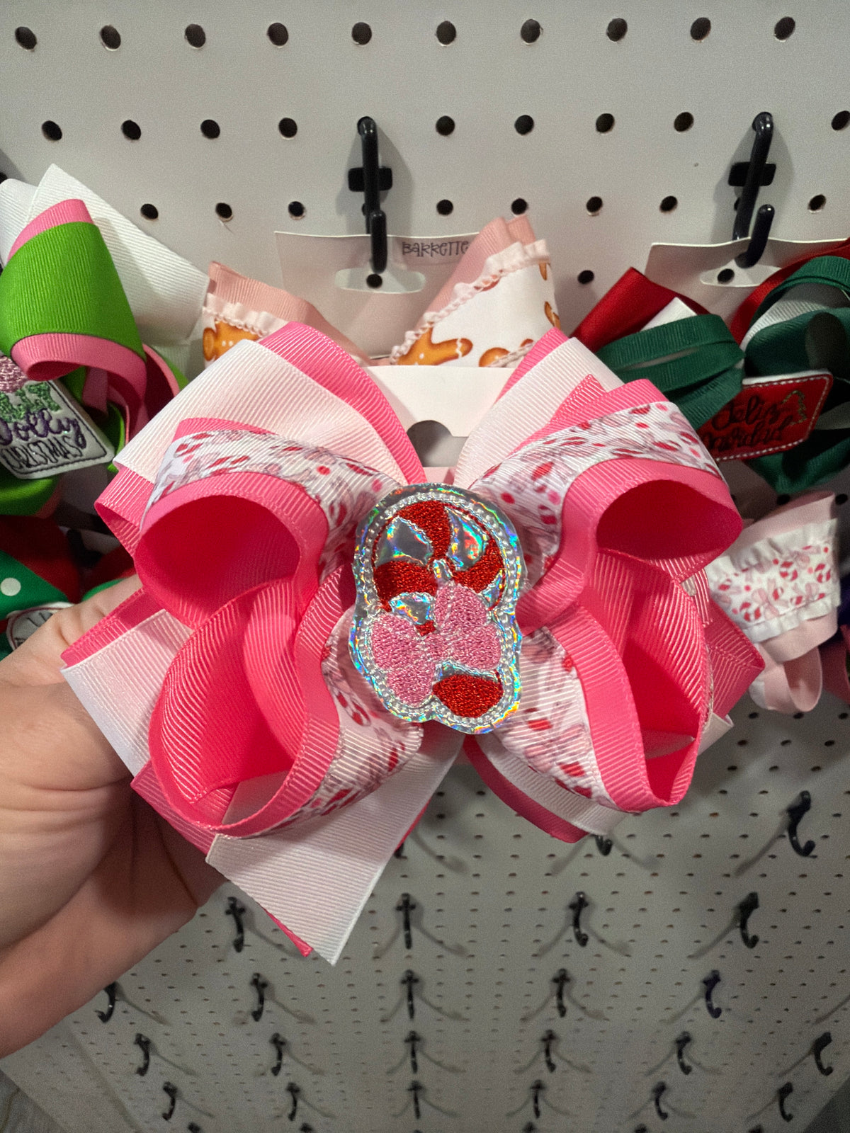 Pink candy cane bow