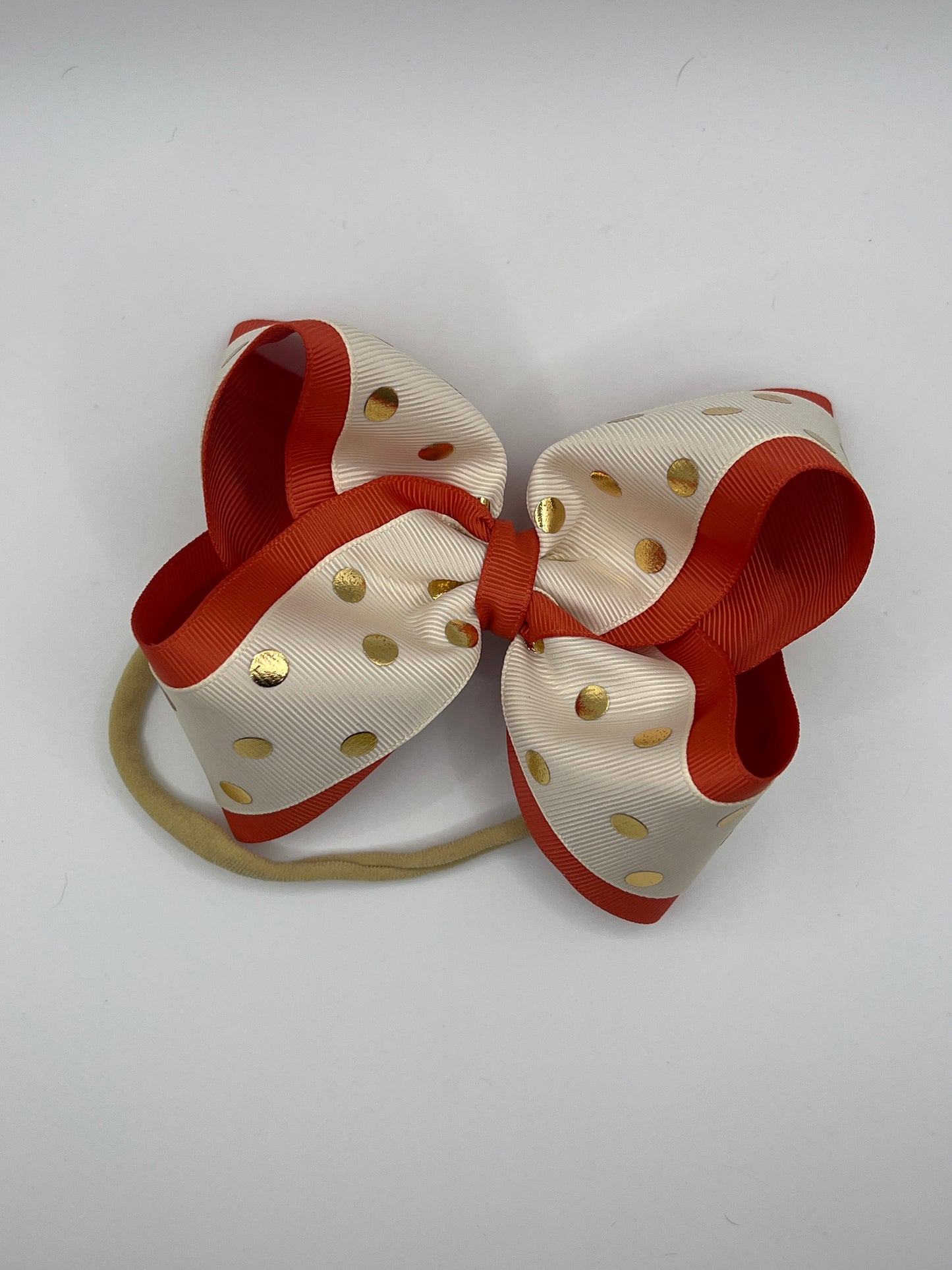 Burnt orange and ivory with gold dots